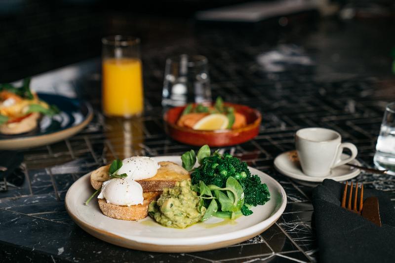 Hotel Zagame'S House Melbourne Esterno foto Avocado and poached egg on toast